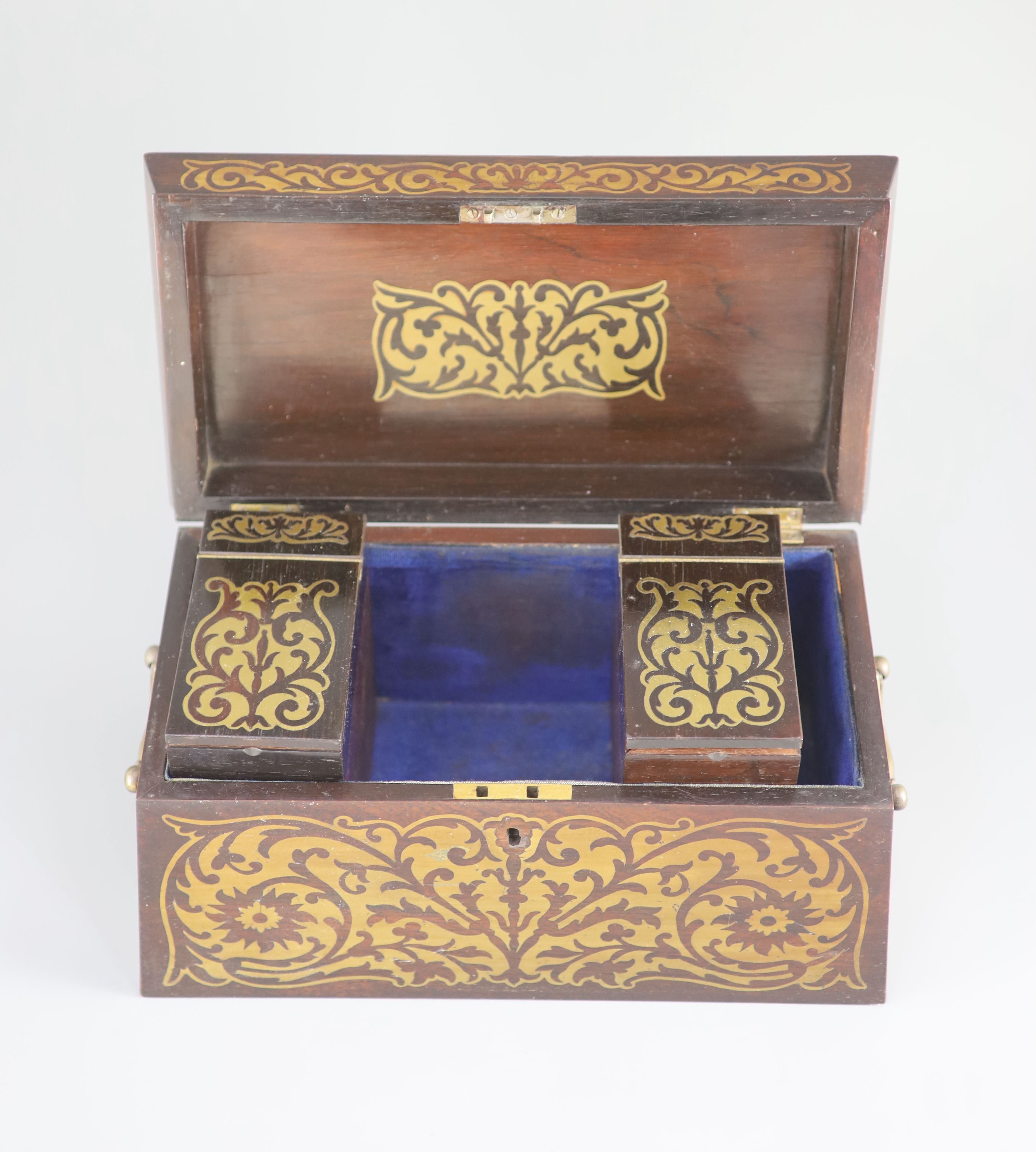 An early 19th century brass inlaid rosewood tea caddy in the boulle manner, 33 x 18cm, 18cm high.